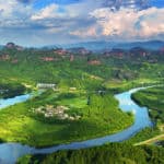 25. 丹霞山全貌 - General View of Mount Danxia: 是丹霞地貌的命名地和世界自然遗产地，有着仙境般的丹山碧水。 As the named place of Danxia landform and the world natural heritage site, Mount Danxia hold the Danshan Clear Water.